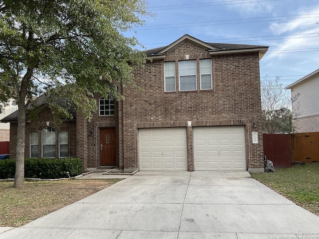 2606 Montebello, San Antonio, TX 78259 - traditional-style home featuring a garage, concrete driveway, and brick siding