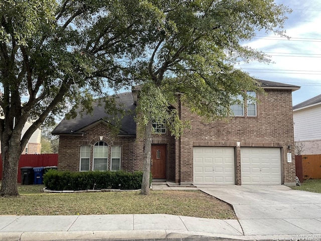 2606 Montebello, San Antonio, TX 78259 - view of front of property with a garage, brick siding, and driveway