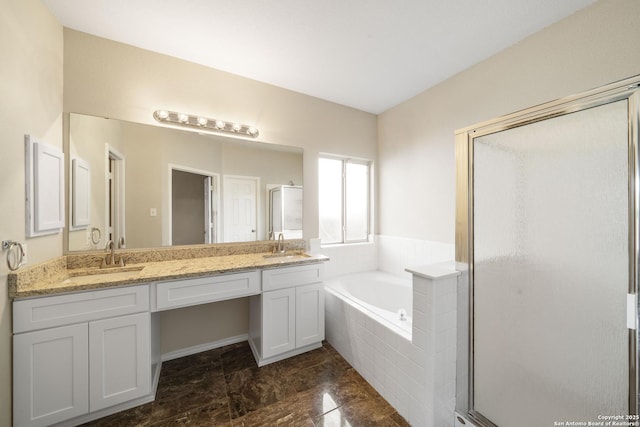 2606 Montebello, San Antonio, TX 78259 - bathroom featuring a garden tub, a stall shower, and double vanity