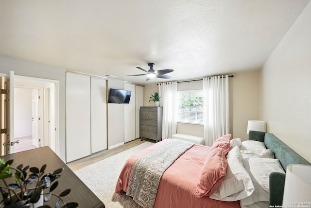 14201 Modesta Pl, San Antonio, TX 78247 - bedroom featuring light wood-type flooring and ceiling fan