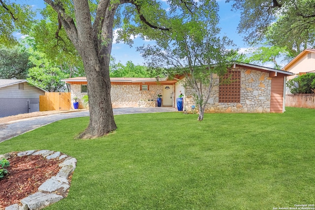 230 Tammy Dr, San Antonio, TX 78216 - view of front of house with stone siding and driveway