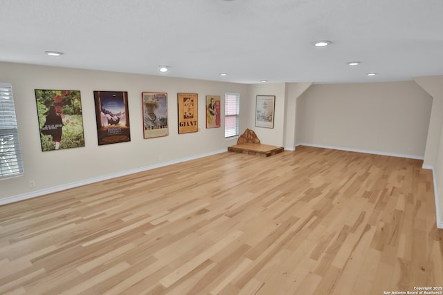 230 Tammy Dr, San Antonio, TX 78216 - basement featuring recessed lighting, light wood-type flooring, and baseboards