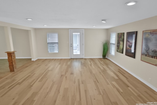 230 Tammy Dr, San Antonio, TX 78216 - unfurnished living room featuring light wood-style flooring, baseboards, and recessed lighting