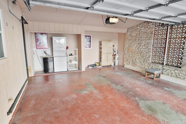230 Tammy Dr, San Antonio, TX 78216 - garage with stacked washer / dryer and a garage door opener