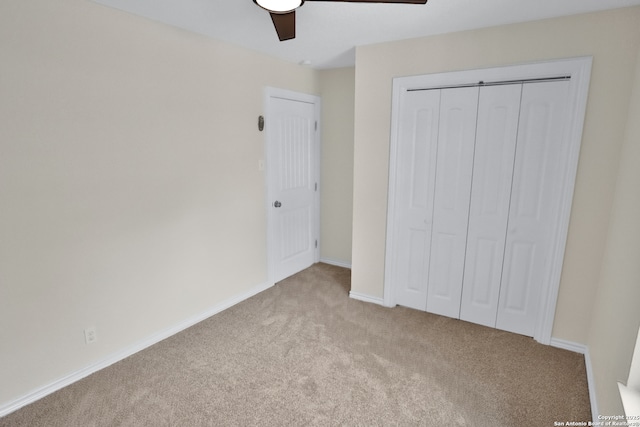 230 Tammy Dr, San Antonio, TX 78216 - unfurnished bedroom featuring light carpet, a closet, baseboards, and ceiling fan