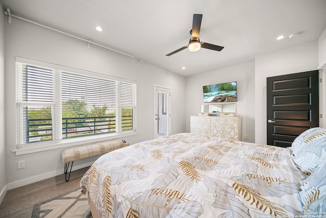 1226 Wyoming Unit 201, San Antonio, TX 78203 - bedroom featuring multiple windows, recessed lighting, wood finished floors, baseboards, and a ceiling fan