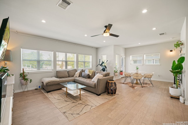 1226 Wyoming Unit 201, San Antonio, TX 78203 - living room featuring recessed lighting, light wood finished floors, a ceiling fan, and baseboards