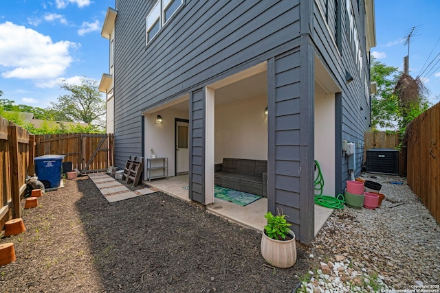 1226 Wyoming Unit 201, San Antonio, TX 78203 - view of side of home featuring central AC unit and a fenced backyard