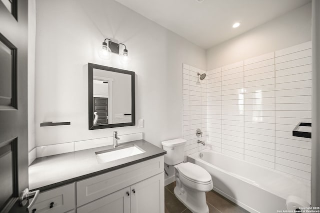1226 Wyoming Unit 201, San Antonio, TX 78203 - full bath featuring toilet, vanity, washtub / shower combination, tile patterned floors, and recessed lighting