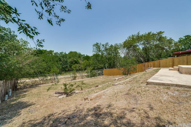 4335 Misty Spgs, San Antonio, TX 78244 - fenced backyard featuring a patio