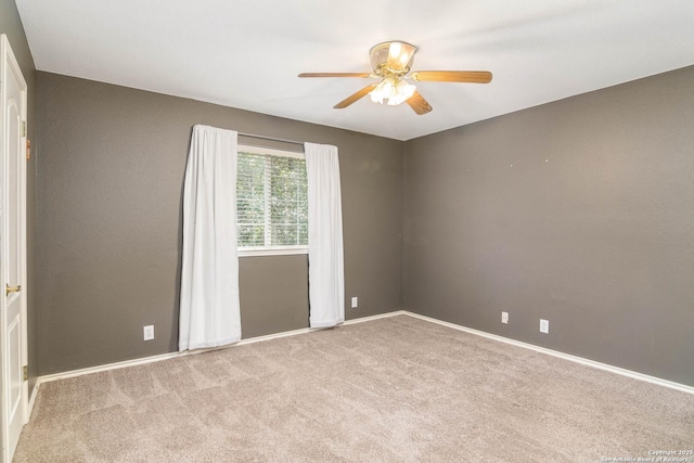 2610 Plum Holw, San Antonio, TX 78258 - spare room featuring a ceiling fan, carpet, and baseboards