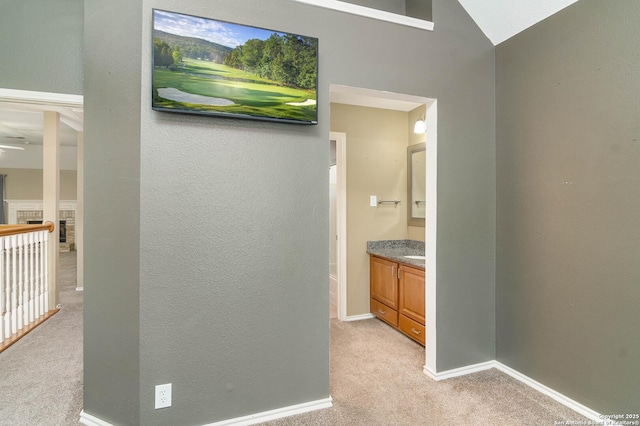 2610 Plum Holw, San Antonio, TX 78258 - hallway with light carpet and baseboards