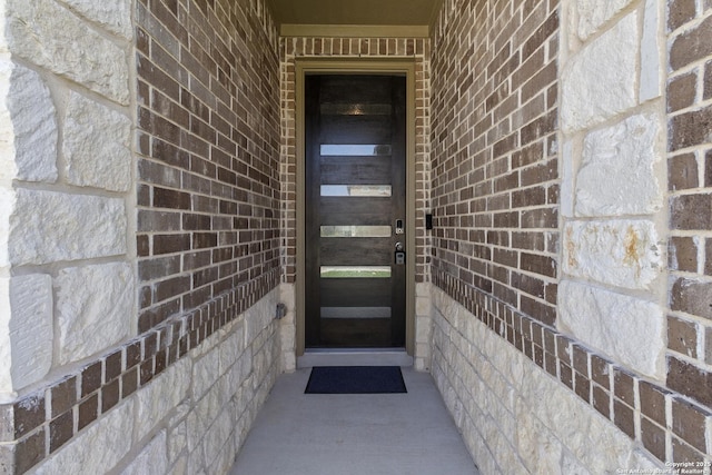 10247 Juniper Oaks, Boerne, TX 78006 - doorway to property featuring brick siding and stone siding