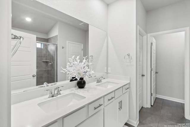 10247 Juniper Oaks, Boerne, TX 78006 - bathroom with double vanity, a stall shower, tile patterned flooring, and baseboards