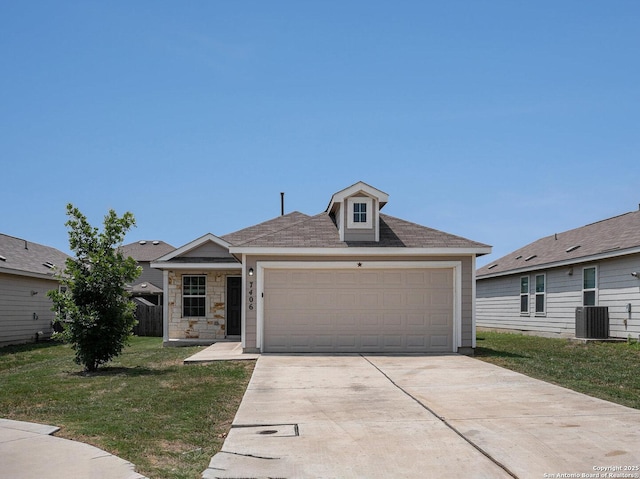 7406 Snapdragon Ct, Converse, TX 78109 - ranch-style house featuring a front lawn, central air condition unit, an attached garage, concrete driveway, and stone siding