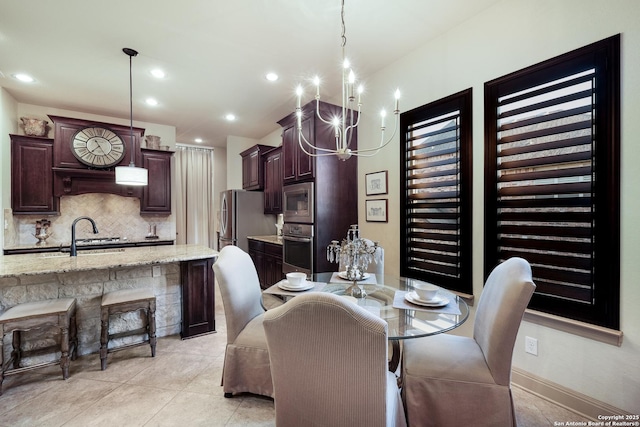 26019 Red Heron, San Antonio, TX 78261 - dining area featuring a chandelier, recessed lighting, light tile patterned floors, and baseboards