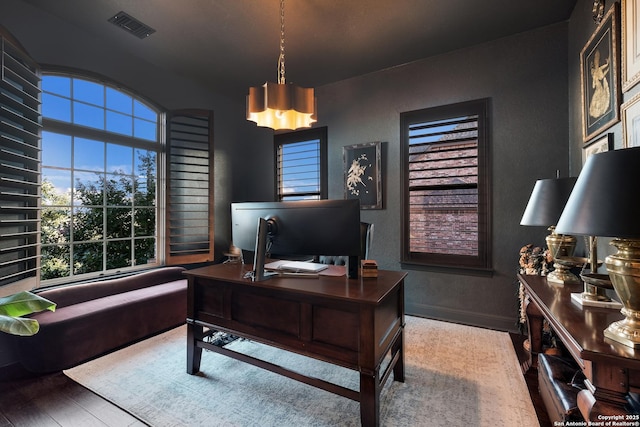 26019 Red Heron, San Antonio, TX 78261 - home office with baseboards, wood finished floors, a chandelier, and a textured wall