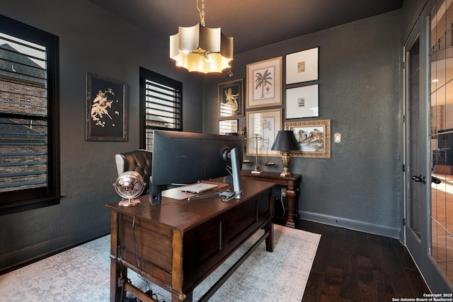 26019 Red Heron, San Antonio, TX 78261 - home office featuring baseboards, wood-type flooring, a textured wall, and a chandelier
