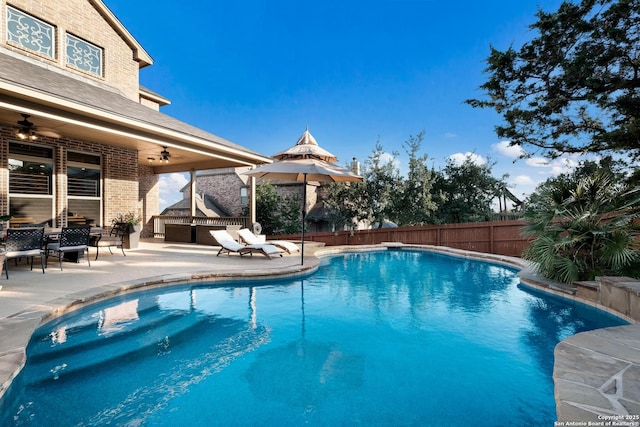 26019 Red Heron, San Antonio, TX 78261 - view of swimming pool with a ceiling fan, a patio, and a fenced backyard