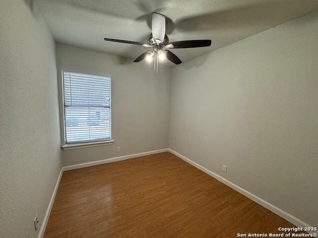 2854 Cherry Fld, San Antonio, TX 78245 - empty room with wood finished floors, a ceiling fan, and baseboards