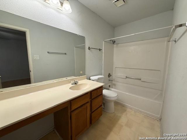 2854 Cherry Fld, San Antonio, TX 78245 - full bathroom featuring toilet, shower / bathtub combination, vanity, and tile patterned floors