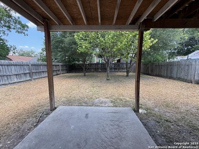 2854 Cherry Fld, San Antonio, TX 78245 - fenced backyard with a patio area