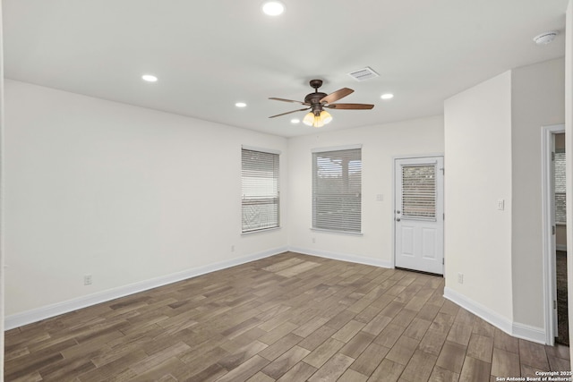 13106 Welder, San Antonio, TX 78253 - empty room with wood finished floors, a ceiling fan, baseboards, recessed lighting, and a smoke detector