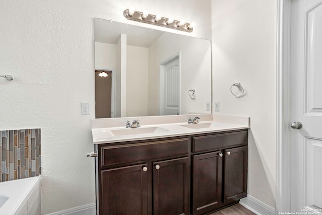 13106 Welder, San Antonio, TX 78253 - bathroom featuring double vanity and a bath