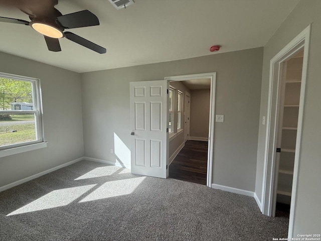 390 W Park St, Vidor, TX 77662 - carpeted spare room featuring a smoke detector, baseboards, and a ceiling fan
