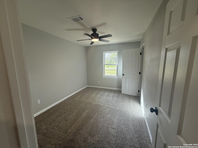 390 W Park St, Vidor, TX 77662 - empty room with carpet floors, baseboards, and ceiling fan