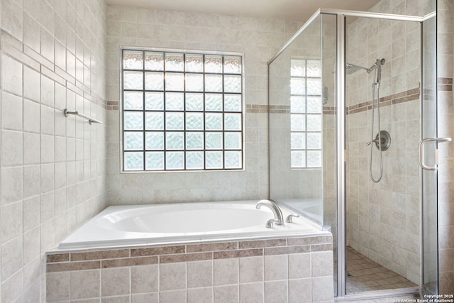 27026 Wooded Acres, San Antonio, TX 78260 - bathroom with a garden tub, a stall shower, and tile walls