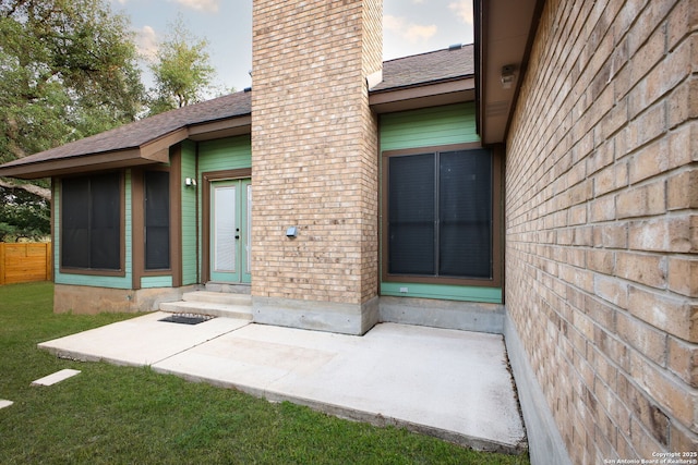 27026 Wooded Acres, San Antonio, TX 78260 - entrance to property featuring a chimney, a patio, and a shingled roof