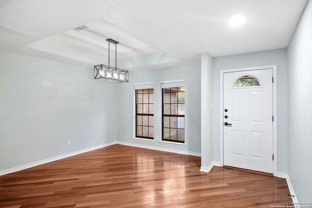 27026 Wooded Acres, San Antonio, TX 78260 - entryway featuring wood finished floors, baseboards, a chandelier, and recessed lighting