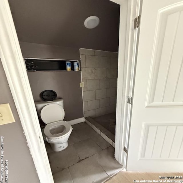 28 28th, Lakehills, TX 78063 - bathroom with toilet and tile patterned floors