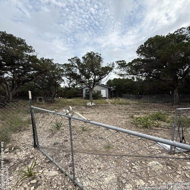 28 28th, Lakehills, TX 78063 - view of yard featuring an outdoor structure