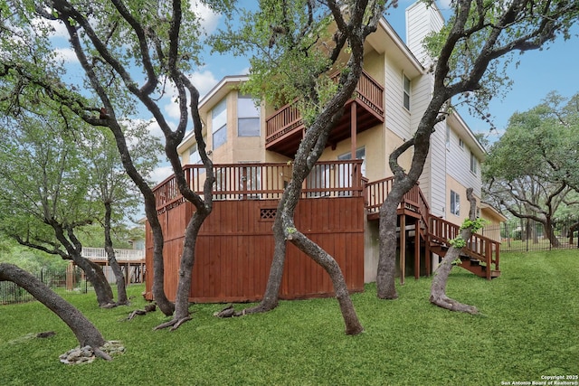 522 Mesa Rdg, San Antonio, TX 78258 - back of house with a balcony, a lawn, stairway, and a chimney