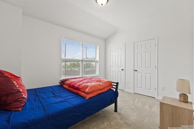 15239 Sirius Cir, San Antonio, TX 78245 - bedroom with light carpet and vaulted ceiling