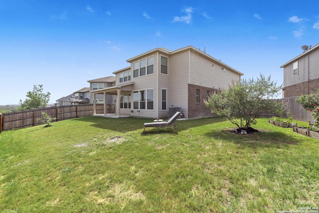 15239 Sirius Cir, San Antonio, TX 78245 - back of house featuring brick siding, cooling unit, and a patio area