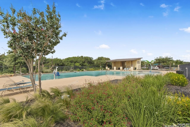 15239 Sirius Cir, San Antonio, TX 78245 - community pool featuring a patio
