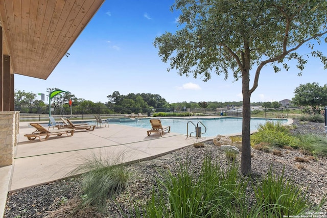15239 Sirius Cir, San Antonio, TX 78245 - community pool featuring a patio