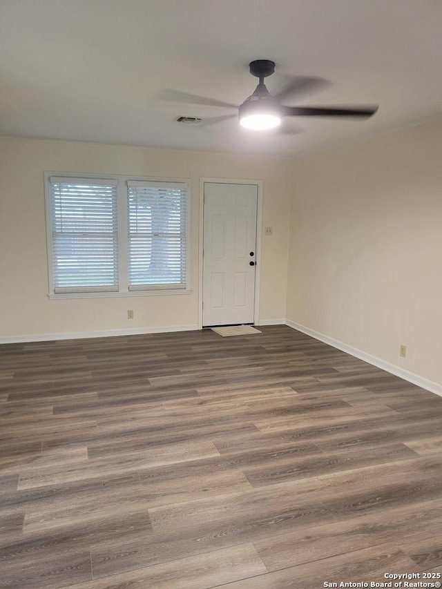 258 Galway, San Antonio, TX 78223 - entrance foyer with a ceiling fan, wood finished floors, and baseboards
