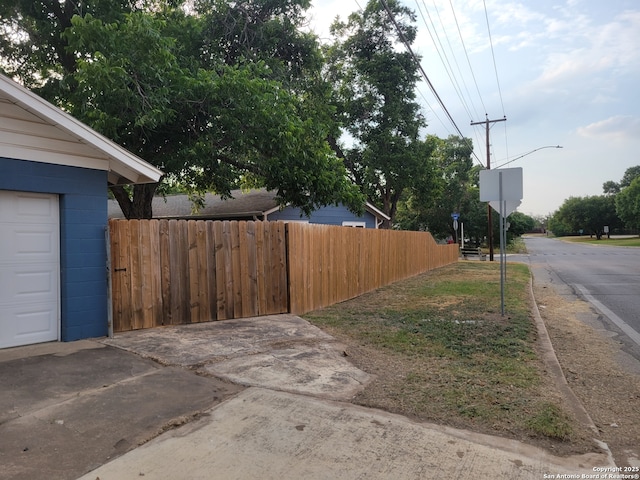 258 Galway, San Antonio, TX 78223 - view of asphalt road featuring traffic signs