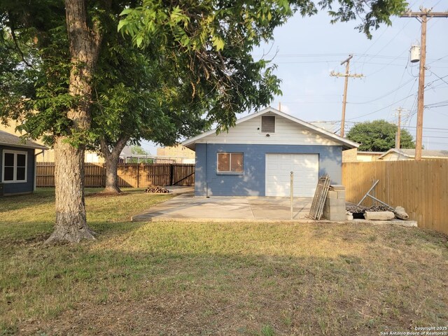 258 Galway, San Antonio, TX 78223 - back of property with a patio area, concrete driveway, a garage, and an outdoor structure