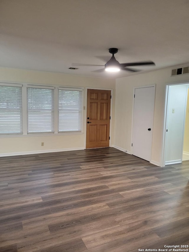258 Galway, San Antonio, TX 78223 - unfurnished room with a ceiling fan, wood finished floors, and baseboards