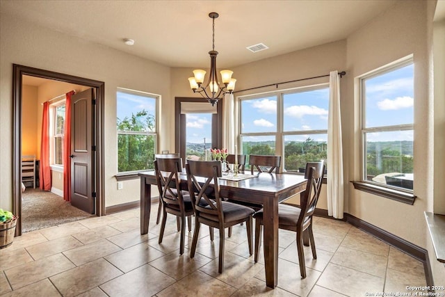 406 Breathless View St, San Antonio, TX 78260 - dining area featuring a chandelier, baseboards, healthy amount of natural light, and light tile patterned flooring