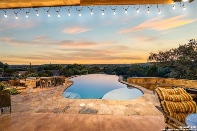406 Breathless View St, San Antonio, TX 78260 - view of pool featuring a patio and an infinity pool