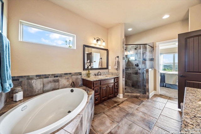 406 Breathless View St, San Antonio, TX 78260 - ensuite bathroom featuring vanity, a bath, a shower stall, and recessed lighting