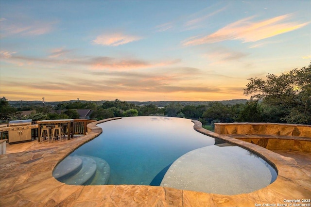 406 Breathless View St, San Antonio, TX 78260 - view of swimming pool with an infinity pool and grilling area