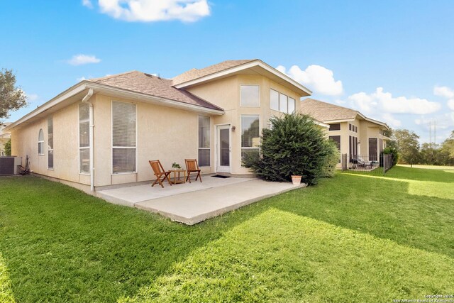 116 Seth Raynor, New Braunfels, TX 78130 - rear view of property with central AC unit, stucco siding, a yard, and a patio