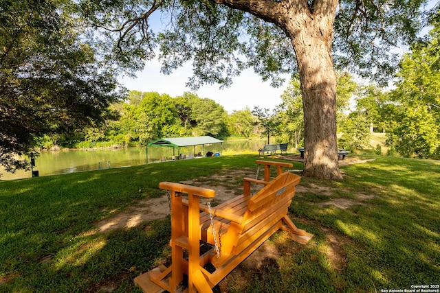 116 Seth Raynor, New Braunfels, TX 78130 - view of green lawn featuring a water view and view of wooded area